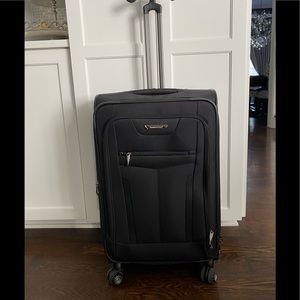 Traveler's Choice  Softside Expandable Luggage w/Spinner Wheels  27”